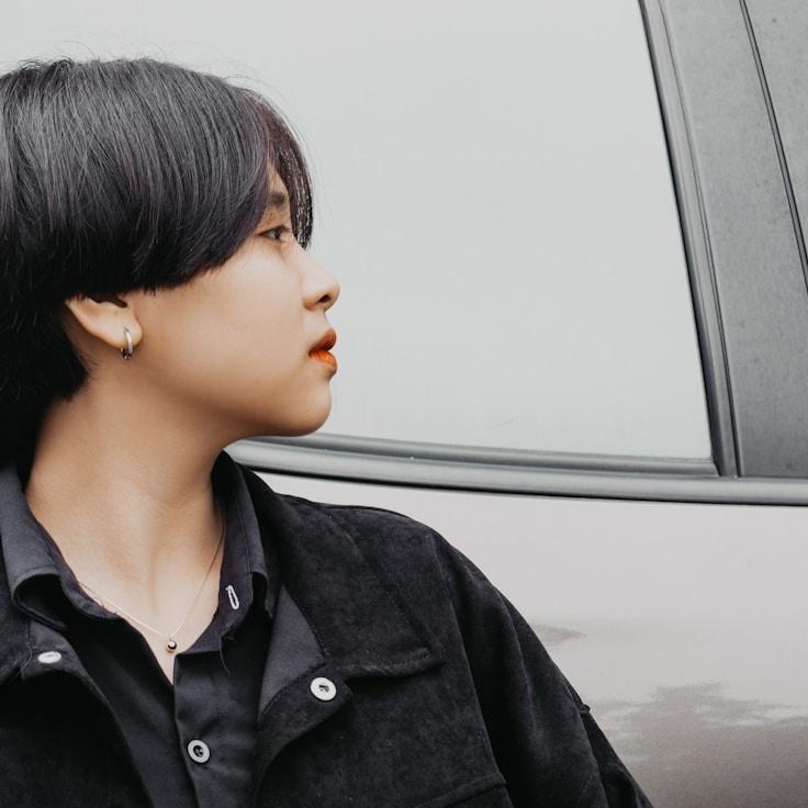 Kaveri Mehta, Lead Design Curator at Urban Crest Labs, reviewing corporate floral arrangements